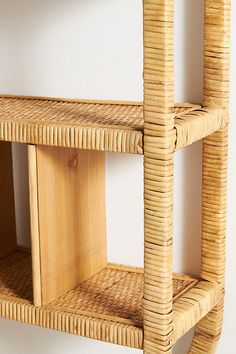 a shelf made out of wicker and wood