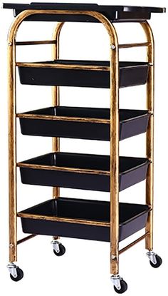 a gold and black trolley with four shelves