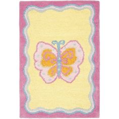 a yellow and pink rug with a butterfly on the front, sitting on a white floor