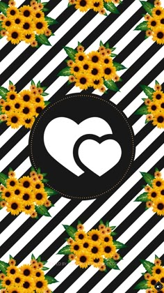 sunflowers are arranged in the shape of a heart on a black and white striped background