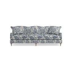 a blue and white couch with pillows on it's back end, against a white background