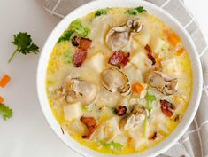 a white bowl filled with food on top of a table