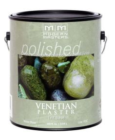 a paint can filled with green and purple rocks