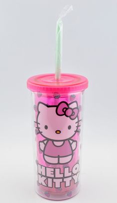 the hello kitty cup has a straw in it