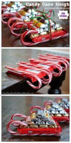 some candy cane sleighs sitting on top of a table with red ribbons