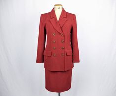 "Beautifully tailored carmine red herringbone wool suit by Yves Saint Laurent. Consists of: -a double breasted long jacket with gold tone metal buttons, flap pockets and shoulder pads -a pencil skirt with side zip/button closure and back slit. Both jacket and skirt are fully lined. Made in France. SIZE TAG: FR38 / US6 FABRIC CONTENT: 100% wool Lining: 55% acetate 45% cupro CONDITION: Excellent, no signs of wear. MEASUREMENTS (taken laid flat, not doubled): JACKET: Shoulder: 41 cm / 16\" Bust: 49 Stretch Velvet Top, Saint Laurent Vintage, Womens Suits, Maxi Jersey Dress, Wool Suit, Silk Twill, Velvet Tops, Lovely Dresses, Skirt Suit