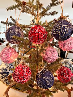 a christmas tree decorated with ornaments and lights