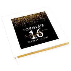 a black and gold foiled photo album with the number one on it's cover