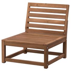 a wooden chair with slatted back and foot rests on an isolated white background