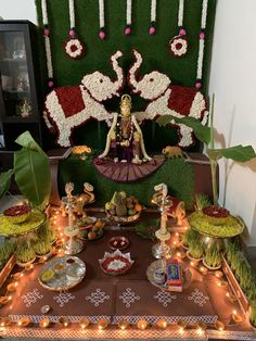 a table topped with lots of food and decorations