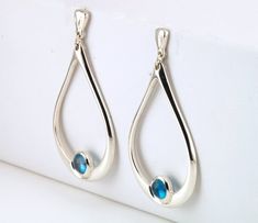 Sterling Silver Hoops, Big Silver Hoop Earrings, Simple Blue Gemstone Earrings Modern Silver Earrings With Birthstone, Modern Silver Birthstone Earrings, Blue Gemstone Earrings, Silver Chandelier Earrings, Earring Hoop, Blue Topaz Jewelry, Silver Chandelier, Topaz Jewelry, Earring Ideas