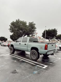 a pick up truck parked in a parking lot