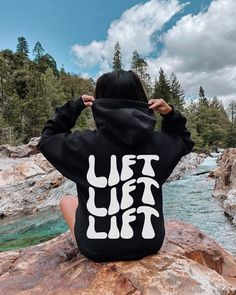 "Are you a fitness enthusiast looking for a workout sweatshirt that is both stylish and functional? Look no further than our Lift Hoodie! This weightlifting sweatshirt is the perfect addition to your workout wardrobe, designed with the modern woman in mind. Our gym hoodie features a trendy retro back print design that says \"lift\", making it the perfect way to showcase your passion for weightlifting. Whether you're a beginner or a seasoned pro, this cute fitness hoodie is the perfect way to showcase your love for the gym in style! For an oversized look please size up! Our hoodies are standard unisex sizes so please check the size chart! This unisex heavy blend hooded sweatshirt is relaxation itself. Made with a thick blend of cotton and polyester, it feels plush, soft and warm, a perfect Estilo Hipster, Ayat Alkitab, Aesthetic Hoodie, Milk Silk, Hipster Fashion, Jesus Saves, Rock Climbing, Fabric Names, Lacrosse