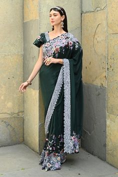 Emerald green saree with meadow bloom embroidery using pearls, multi thread, sequin highlights. Paired with an umbrella sleeves sequin wave embroidered blouse. - Aza Fashions Festive Green Pre-draped Saree With Floral Embroidery, Green Pre-draped Saree With Floral Embroidery, Green Floral Embroidered Saree For Reception, Designer Green Pre-draped Saree With Floral Embroidery, Elegant Green Saree With Floral Embroidery, Green Georgette Saree With Floral Embroidery, Emerald Green Saree, Umbrella Sleeves, Green Couture