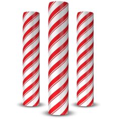 three red and white candy canes on a white background