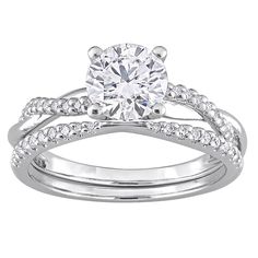 a white gold engagement ring set with diamonds