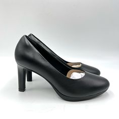 Clarks Women's Ambyr Joy Black Leather Heels / Pumps / Shoes. Women's Size 7.5. Condition: New Without Box. New To Poshmark? Sign Up Using Invite Code: Tentoday For $10 Off Your Purchase! Catch Eyes In The Ambyr Joy Platform Pump From Clarks. This Pair Features An Ortholite Sheet Footbed With Perforated Arch Support For Daylong Comfort. - Synthetic Upper - Slip-On - Round Toe - Fabric Lining - Ortholite Sheet Footbed - ¾" Platform, 3½" Covered Heel - Tpr Sole Business Court Shoes With 4-inch Heel And Round Toe, Office Heels With Round Toe In Synthetic Material, Faux Leather Court Shoes With Padded Heel For Work, Classic Heels With Padded Heel In Faux Leather, Elegant Low Heel Platform Court Shoes, Workwear Almond Toe Faux Leather Heels, Office Heels With Round Toe In Faux Leather, Closed Toe Faux Leather Heels For Office, Medium Width Faux Leather Court Shoes For Work