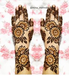 the feet are decorated with henna and flowers