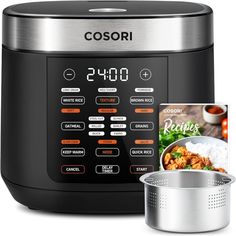 an electric pressure cooker and cookbook next to it's digital display screen