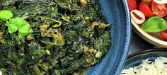 there are many different types of food in the bowls on the table together, including tomatoes and spinach