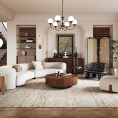 a living room filled with furniture and a chandelier