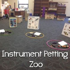 there are several different items on the floor in this room that says instrument petting zoo