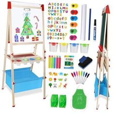 a child's art easel with supplies including markers, pencils and markers