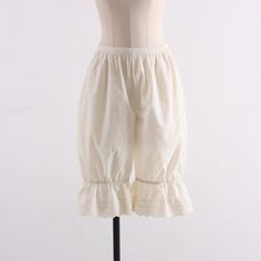 Cotton Bloomers With Ruffles, Cotton Ruffle Long Pants, White Cotton Bloomers With Elastic Waistband, Fitted Cotton Bloomers With Ruffles, Cotton Ruffled Bloomers, Fitted Cotton Bottoms With Ruffles, Stretch Cotton Pants With Lace Trim, Fitted Cotton Bloomers With Elastic Waistband, Cotton Wide-leg Bottoms With Lace Trim