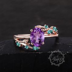 Vintage Oval Amethyst Engagement Ring 14KRose Gold Promise Ring Leaf Cluster Ring Art Deco Ring Unique Purple Crystal Ring Anniversary Gifts Engagement ring Center Stone:Amethyst Cut:Oval cut Size:6*8mm Side Stone:0.09 Lab Emerald Width:1.8mm Thickness :1.2mm  Ring Size & Gold Color Ring Size: 3US-10US available. But if you need a smaller or larger size, please feel free to contact me. I would love to make it for you at a reasonable price. Gold Color:10K/14K/18K Yellow/ White/Rose Gold and platinum available Processing time Dute to all our jewelry are made to order for each customer.Your package will ship within 3-4 weeks of purchase.We need to ensure the quality of each jewelry.Thank you for your patience.  More Information *Custom Order *Rush Orders *Payment plan *Engraving service *Free Amethyst Engagement Ring, Gold Promise Ring, Emerald Rings, Amethyst Ring Engagement, Gold Promise Rings, Gold Color Ring, Ring Art Deco, Purple Crystal, Deco Ring