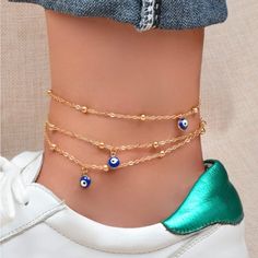 Evil Eve Charm Lavered Anklet Casual Ankle Strap Anklets For Spring, Casual Spring Anklets, Evil Eye Jewellery, Evil Eye Anklet, Greek Eye, Concert Hairstyles, Anklet Gold, Dainty Jewellery, Charm Anklet