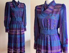 Fabulous 1970s long sleeve dress by Leslie Fay. Tag size 10, fits like a M (see measurements below). Lovely lightweight semi-sheer fabric (probably meant to be worn over slip); blue, purple, and pink abstract pattern. Elastic waist; matching belt with snap and hook closure; zip and button back; button cuffs; shoulder pads; cowl neck. Excellent condition. Bust: 38" Waist: 29" belted waist; 34" max stretch unbelted Length: 45" Sleeve length: 24.5" Label: Leslie Fay Material: none listed; feels lik 1970s Blue Long Sleeve Dress, 1970s Long Sleeve Blue Dresses, Syracuse New York, Syracuse Ny, Pink Abstract, Curated Vintage, Sheer Fabric, Blue Long Sleeve, Sheer Dress