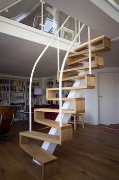 there is a spiral staircase in the living room