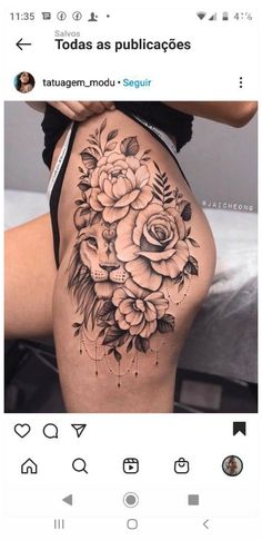 a woman's thigh with roses and leaves on it