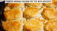 chicken pot pie with biscuits in a cast iron skillet