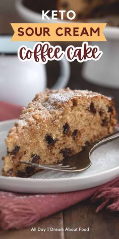 a close up of a piece of cake on a plate with the words keto sour cream coffee cake