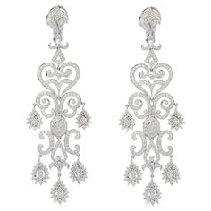 Genuine 10.76 Carats Diamond Chandelier Earrings in 18K Gold to make a statement with your look. You shall need dangle earrings to make a statement with your look. These earrings create a sparkling, luxurious look featuring round cut diamond. April birthstone diamond brings love, fame, success and prosperity. Designed with round cut diamond all over the chandelier earrings to make you stand out of any occasion or event. This is a perfect Gift for Women, Bridal Shower Gift, Valentine Gift, Gift f Luxury Handmade Fusion Chandelier Earrings, Luxury Pierced Chandelier Earrings For Anniversary, Luxury Pierced Chandelier Earrings For Formal Events, Luxury Bridal Clip-on Drop Earrings, Luxury Pierced Dangle Chandelier Earrings, Luxury Clip-on Dangle Earrings, Luxury Dangle Chandelier Earrings For Anniversary, Luxury Chandelier Drop Earrings For Anniversary, Earrings To Make