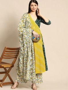 * Women Yellow Bandhani Printed Angrakha Pure Cotton Kurta with Trousers & Dupatta Pure Cotton Kurta Set / Sleeveless Kurta Set / Indian Wedding Wear Salwar Kameez / Silk Kurta Sets / Indian Ethnic Dress / Plus Size Silk Kurta Dress Traditional Indian Wear / Salwar Kameez Dupatta / Kurti Palazzo Set * Yellow & green printed Kurta with Trousers with dupatta * Kurta design:- * Bandhani printed * Anarkali shape * Angrakha style * V-neck, three-quarter regular sleeves * Gotta patti detail   Calf len Bohemian Green Cotton Anarkali Set, Green Bohemian Cotton Anarkali Set, Bohemian Green Anarkali Set With Block Print, Yellow Bohemian Palazzo Set With Dupatta, Yellow Cotton Sharara With Printed Motifs, Traditional Green Block Print Sharara, Traditional Green Sharara With Block Print, Bohemian Green Set With Block Print, Bohemian Green Block Print Set