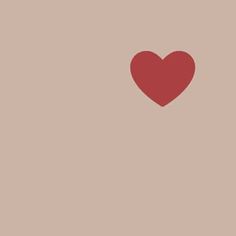 a red heart on a beige background