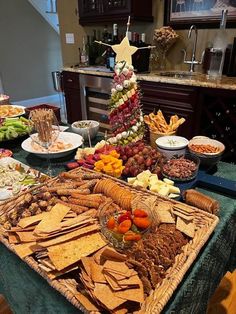 a christmas tree made out of crackers and fruit