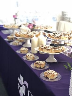 there are many desserts on the table ready to be eaten and served for guests