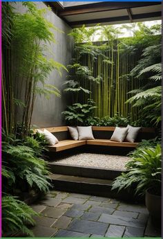 an outdoor seating area with lots of plants