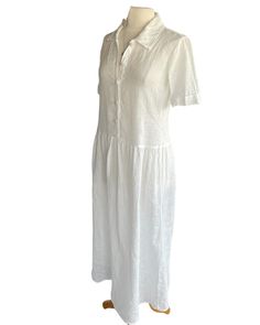 The perfect summer day dress. Relaxed fit with dropped waist, slightly tapered waist, long gathered skirt, button front closure, short sleeves, and collar. Handkerchief luxe linen, covered buttons. Small, Medium, Large Made in small batches, please allow up to 3 weeks for delivery is out of stock. Length can be shortened. For further questions or additional information, please email brigittehartdresses@gmail.com Elegant Short Sleeve Linen Dress With Relaxed Fit, Elegant Relaxed Fit Short Sleeve Linen Dress, Classic Linen Shirt Dress For Daywear, Classic Linen Short Sleeve Dress For Summer, Classic Short Sleeve Linen Summer Dress, Classic Short Sleeve Linen Dress For Summer, Fitted Linen Shirt Dress For Daywear, Elegant Short Sleeve Linen Dress For Daywear, Elegant Short Sleeve Linen Day Dress