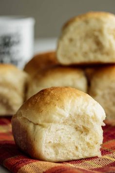 rolls sitting on top of a red and yellow towel