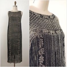 "Stunning and rare early 1920s Art Deco black beaded dress by Harry Collins New York. American designer played a huge role in defining the America style of 1910s-1920s. Lined half way down with a beautiful satin like golden fabric and laced trim. Beautifully made!  Size xxs Bust 30\"- 31\" Waist 30\"- 32\" Hips 34\"-36\" Length 47\" Condition nice. A few lines of the beading on the right side front are missing and one half way on the back and side. Also a few line on the bottom trim (back). The dress still very sturdy because the extra protection of the lining. Look closely sold as is. Please let me know if you have any questions I'm here to help.  Happy shopping!" 1920s Couture, 1920s Day Dress, 1920s Evening Dress, Golden Fabric, 1920 Dress, Black Beaded Dress, Hollywood Costume, Flapper Style, 1920s Dress