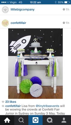 an image of a table with cake and decorations for a space themed birthday party on instagram