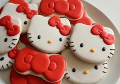 hello kitty cookies are arranged on a plate