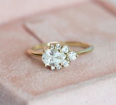 an engagement ring with three diamonds on it