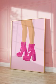 a pink framed photograph of a woman's legs in high - heeled boots