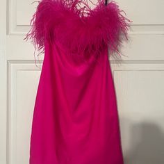 Hot Pink Stretchy Dress With Feather Top Outline. Dress Is A Size 2 But Has Lots Of Stretch And Very Comfortable. Built In Bra With Non Slip Elastic. Worn Once For Homecoming For 3 Hours. Paid $820 Originally For Dress At Boutique Bridal And Dress Gallery. Dresses Hot Pink, Feather Top, Hot Pink Dress, Feather Tops, Alyce Paris, Dress Gallery, Hot Pink Dresses, Paris Dresses, Stretchy Dress