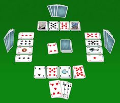 an image of playing cards on a green background